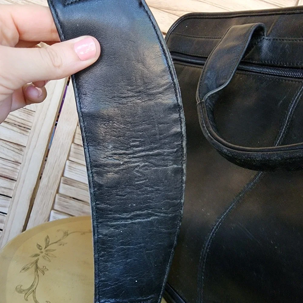 Tumi black leather